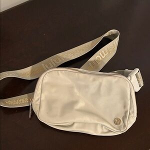 Lululemon Athletica Gray Bag with Gold Strap
